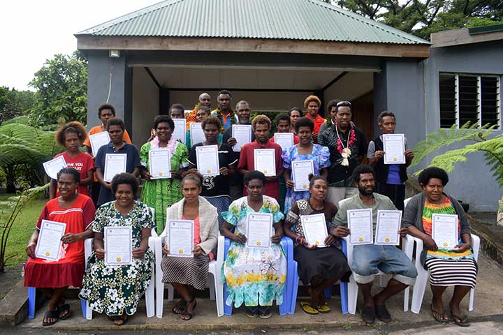 Accomodation Service graduates receiving their Certificate of Attendance at Entani Kampani, Tanna