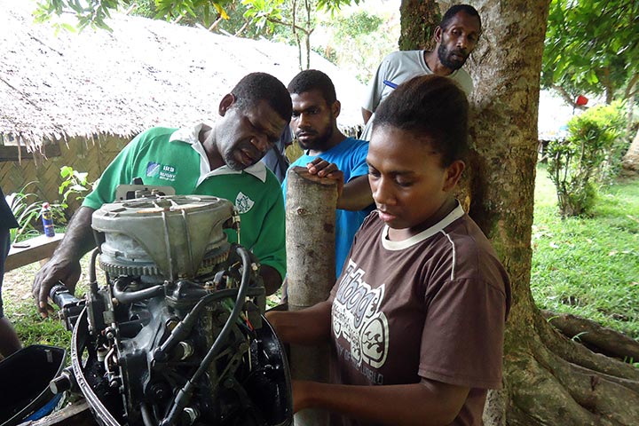 A young woman is taught mechanics at Pektel Rural Training Centre, Malekula