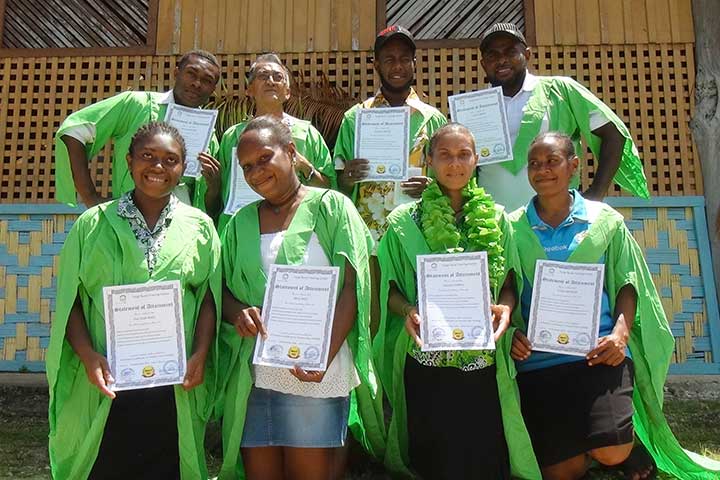 Tour guide training students receiving their certificates