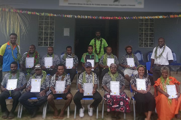 Graduates of the Tour Guide receiving their certificate of attendance at Analcauhat, Aneityum